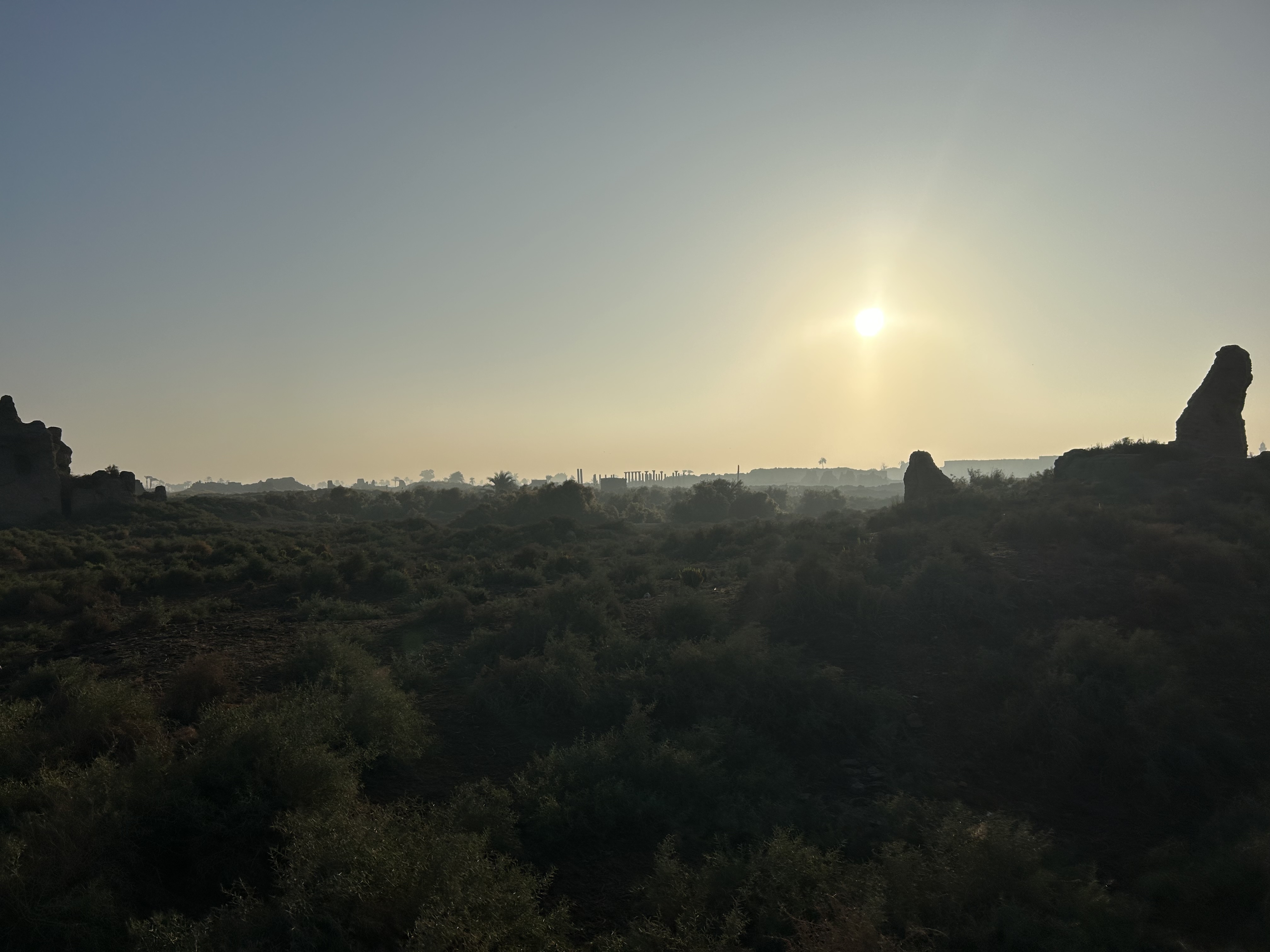 Silhouetted ruins against the sky